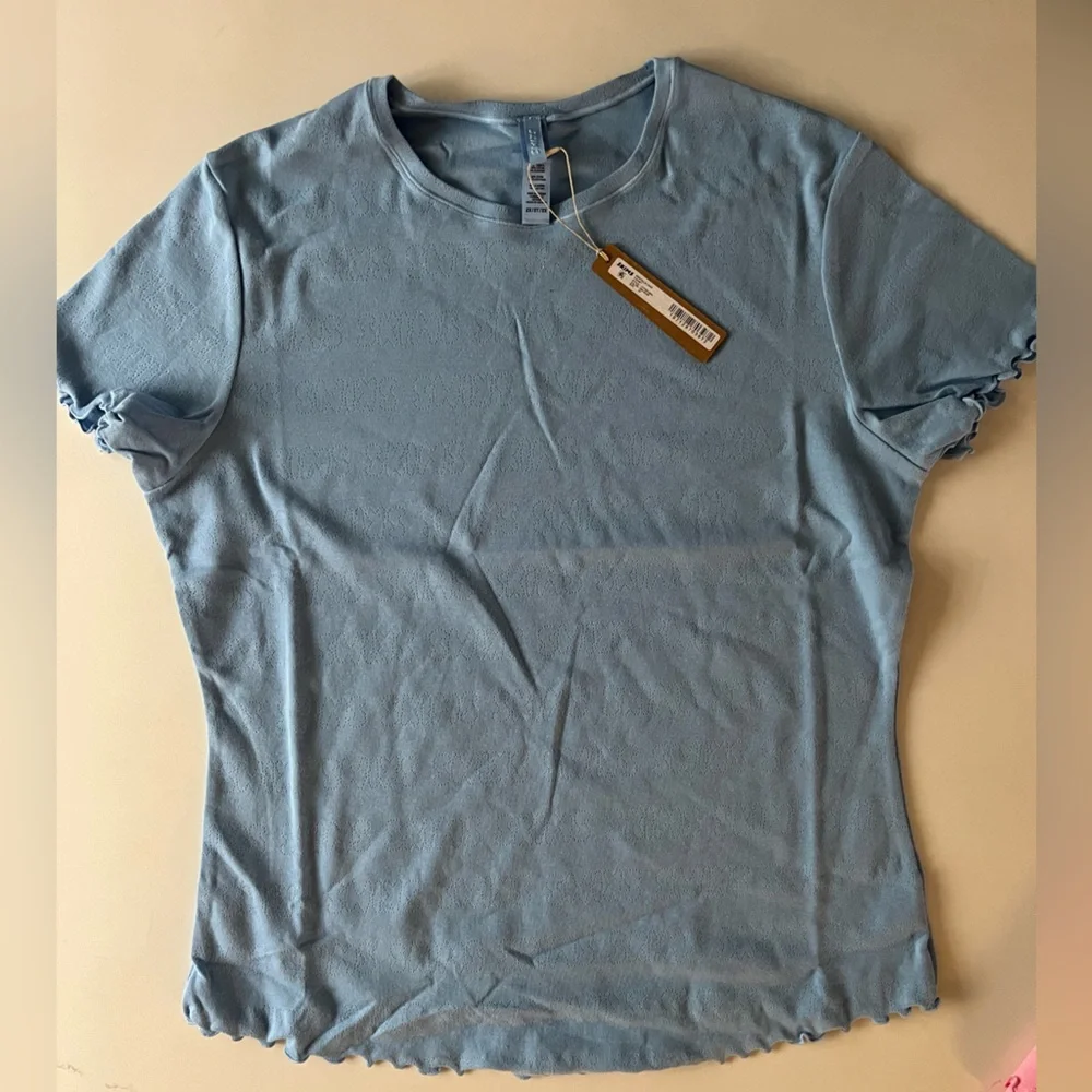 SKIMS T-Shirt 4 Pack - Picture 4 of 9